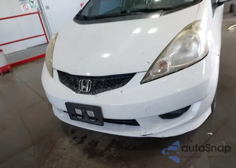 2009 Honda Fit Sport from USA, damaged, VIN JHMGE886X9S012244